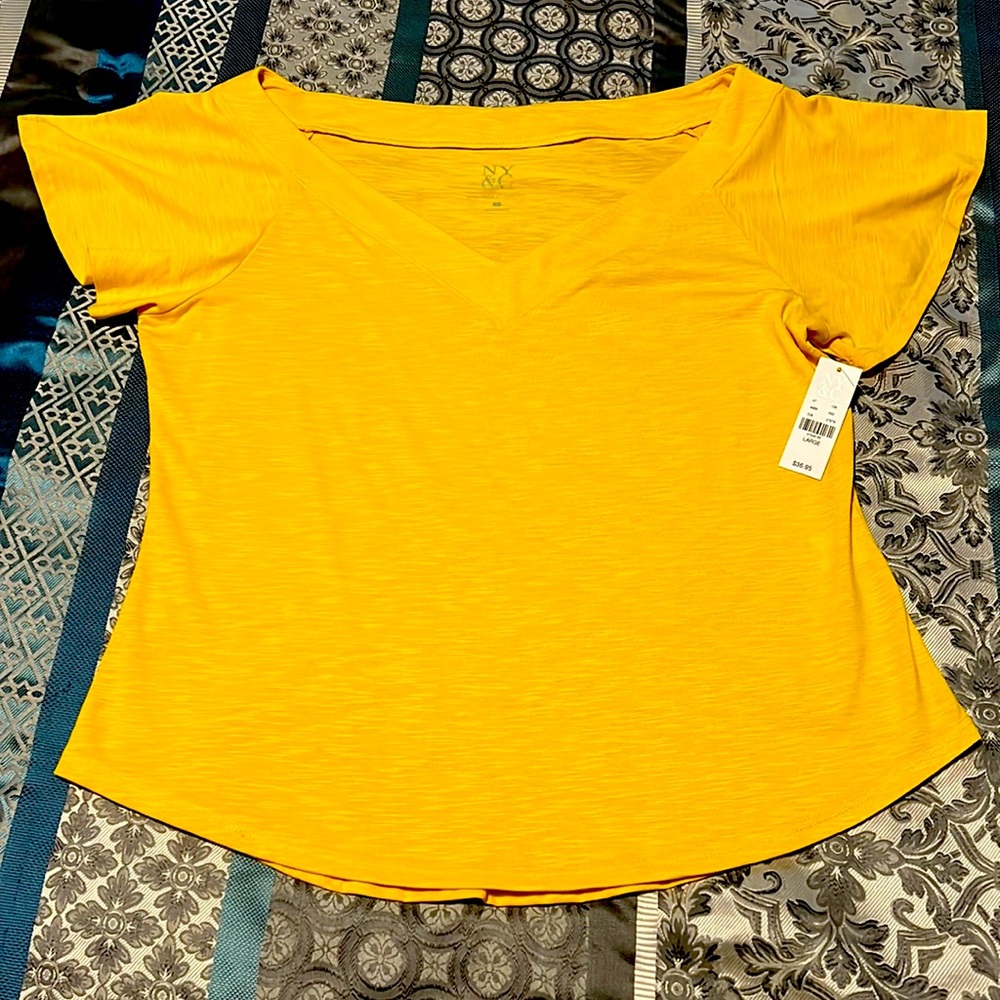 Sunshine yellow short sleeve shirt.